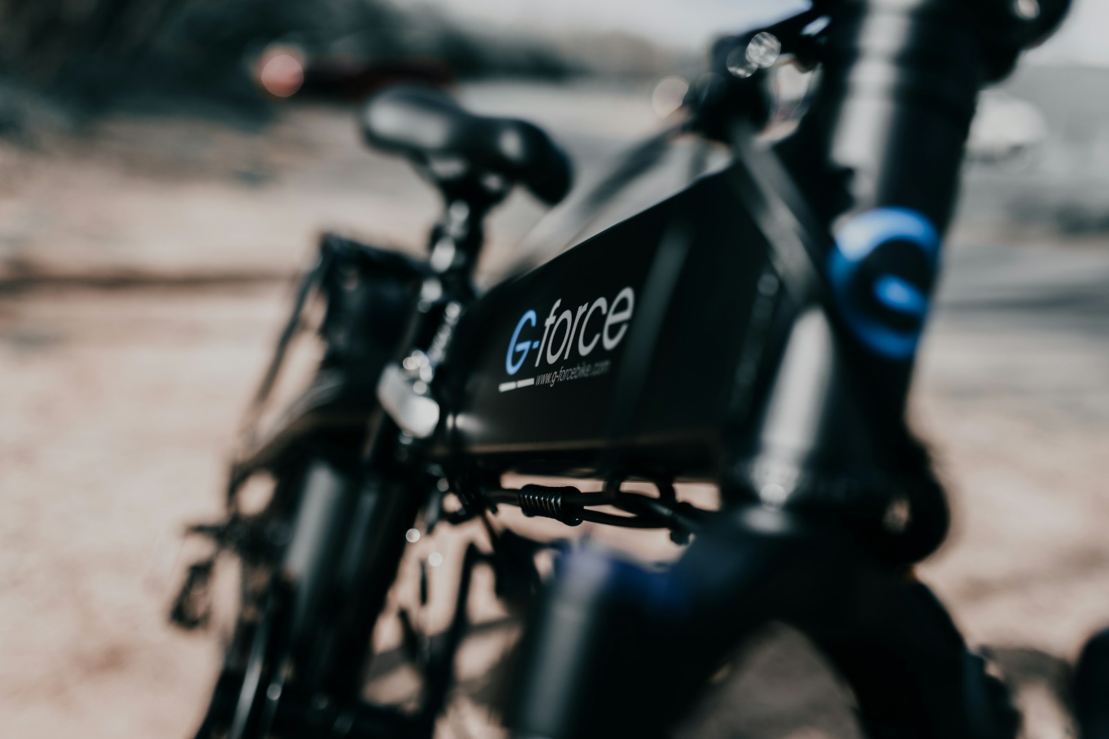 a close up of a bike parked on the side of a road